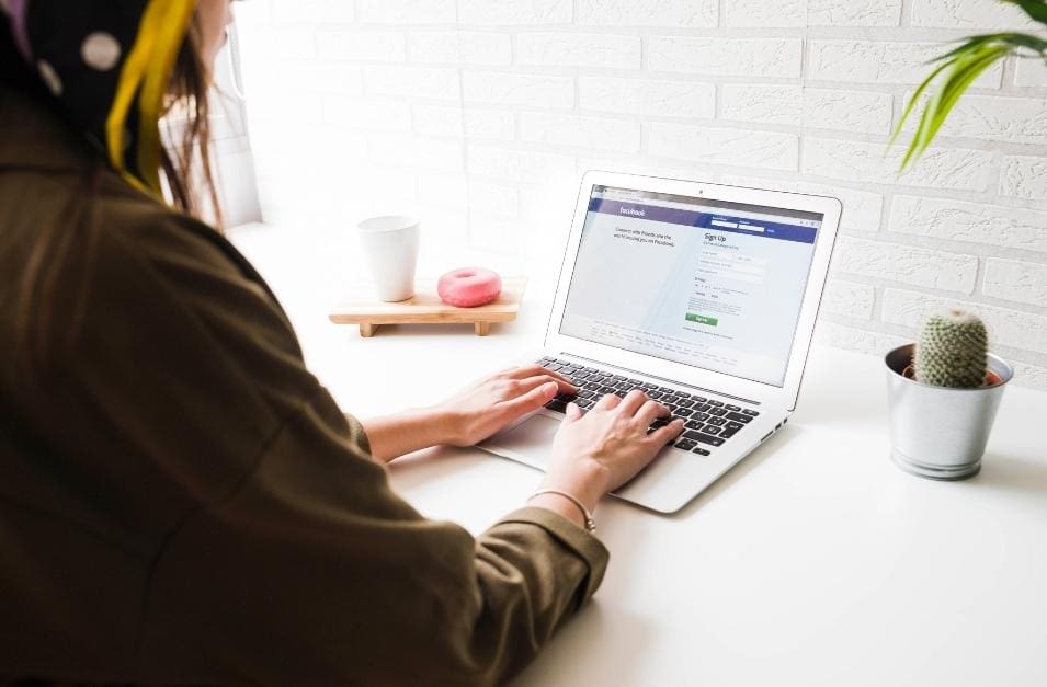 Business Woman Using Facebook